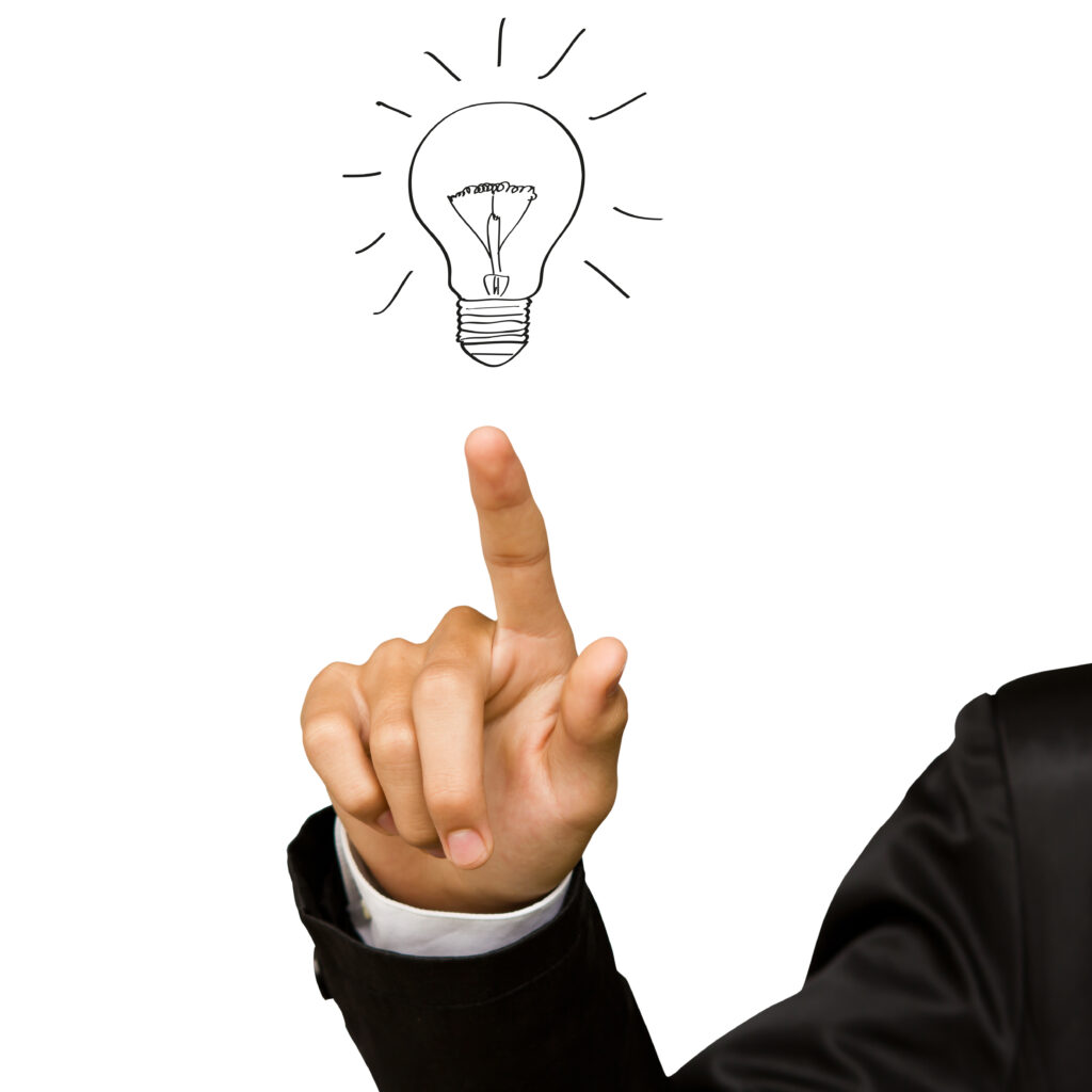 business man hand drawing light bulb isolated on white